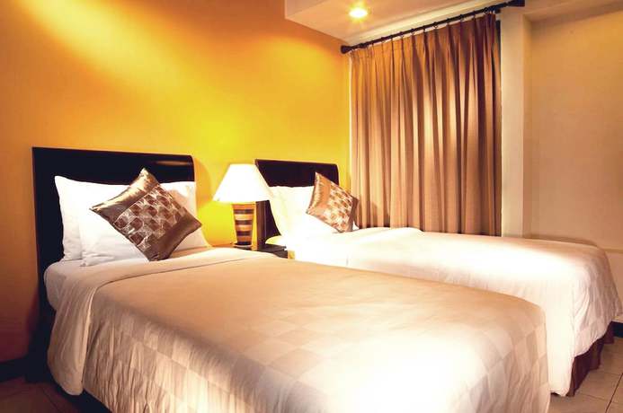 Imagen de la habitación del Hotel Grand Tropic Suites. Foto 11