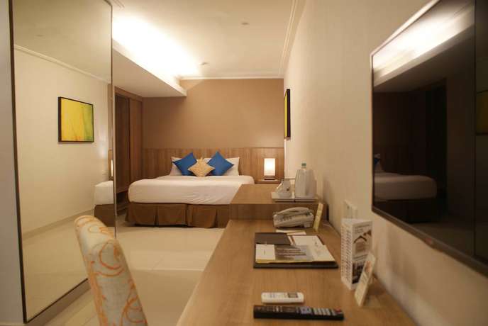 Imagen de la habitación del Hotel Grand Tropic Suites. Foto 12
