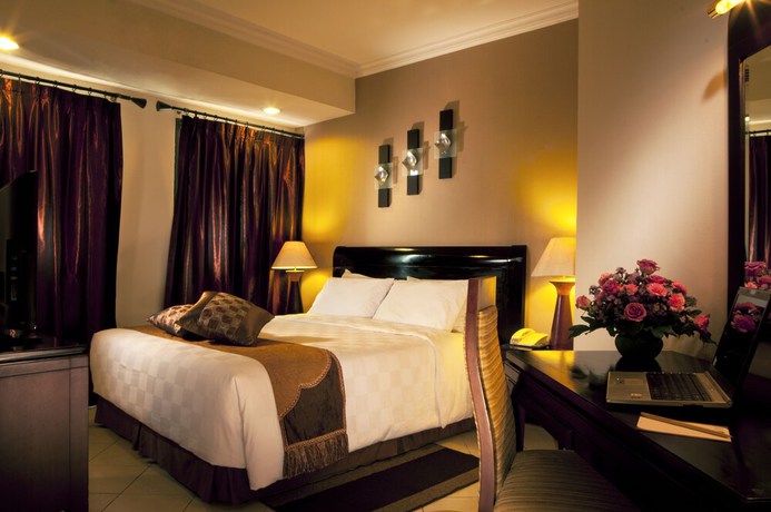 Imagen de la habitación del Hotel Grand Tropic Suites. Foto 13