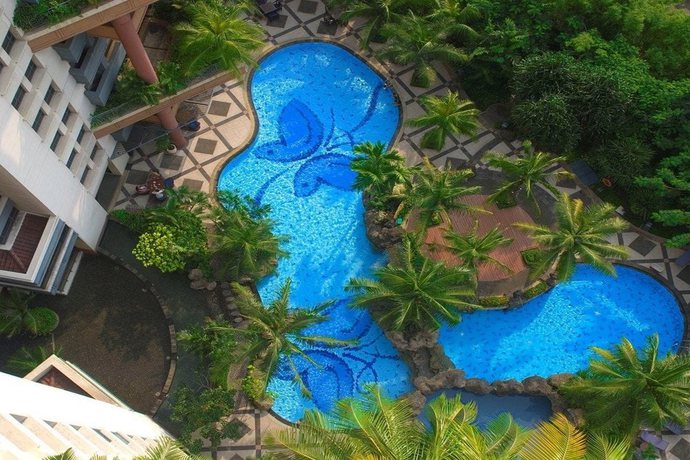 Imagen de la piscina del Hotel Grand Tropic Suites. Foto 22