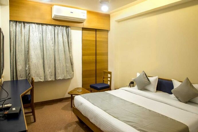 Imagen de la habitación del Hotel Grand Unity. Foto 10