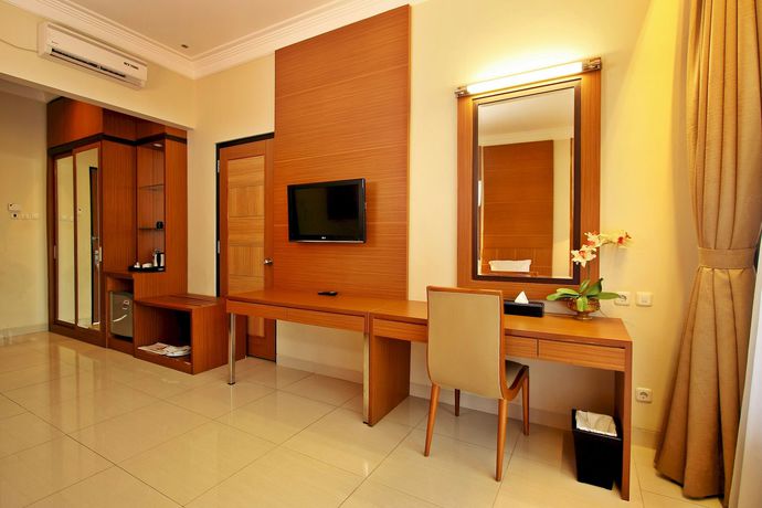 Imagen de la habitación del Hotel Grand Ussu And Convention. Foto 6