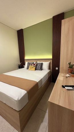 Imagen de la habitación del Hotel Grand Valora Siliwangi Kostel. Foto 9
