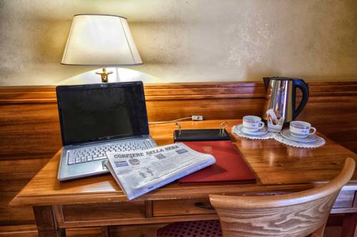 Imagen de la habitación del Hotel Grand Vigna Nocelli. Foto 8