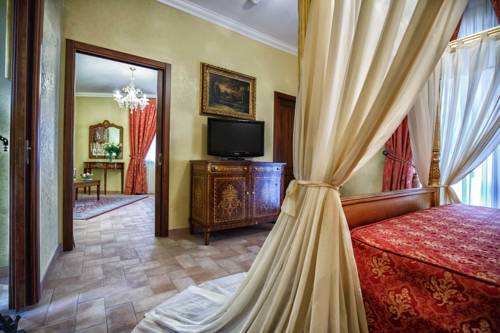 Imagen de la habitación del Hotel Grand Vigna Nocelli. Foto 13