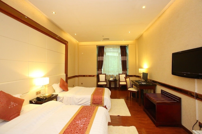 Imagen de la habitación del Hotel Grand Villa. Foto 7