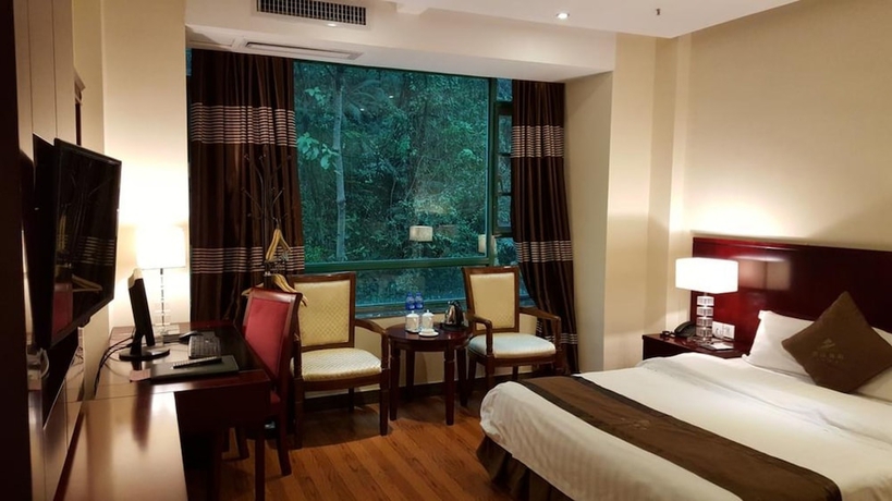 Imagen de la habitación del Hotel Grand Villa. Foto 9