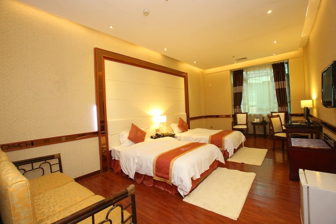 Imagen de la habitación del Hotel Grand Villa. Foto 14