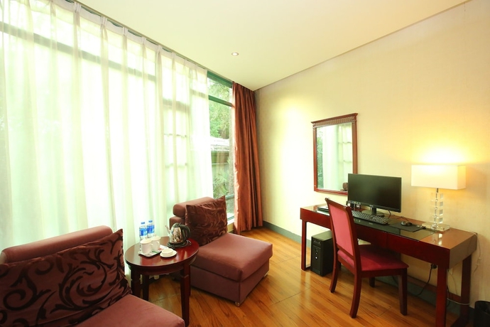 Imagen de la habitación del Hotel Grand Villa. Foto 16