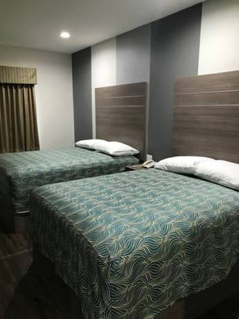 Imagen de la habitación del Hotel Grand Villa Inn and Suites - Humble. Foto 3