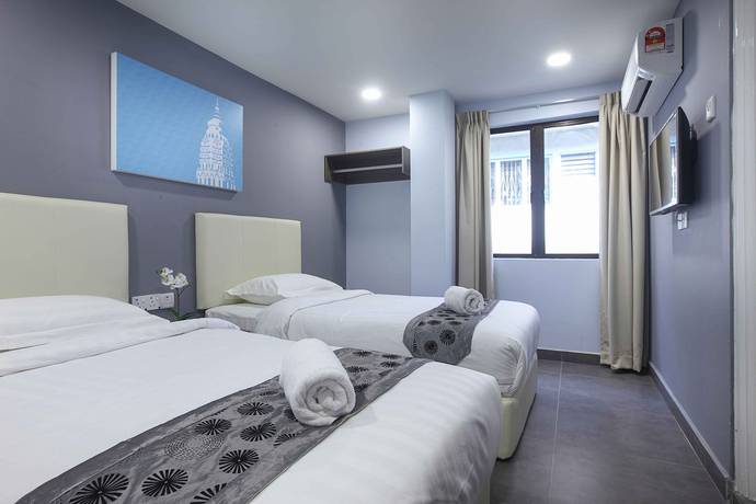 Imagen de la habitación del Hotel Grand Village. Foto 13