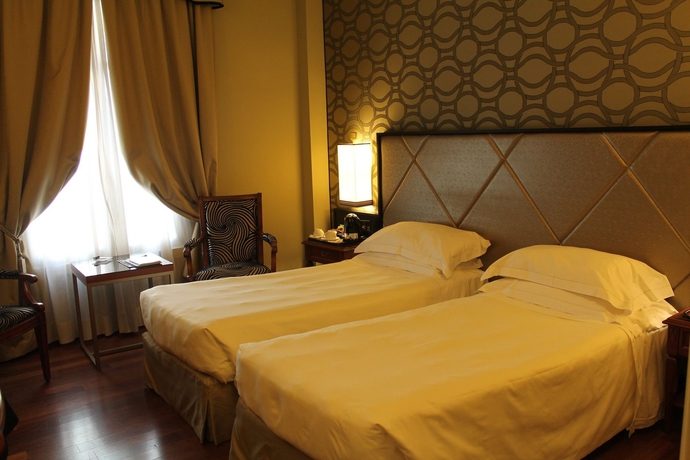 Imagen de la habitación del Hotel Grand Visconti Palace. Foto 7