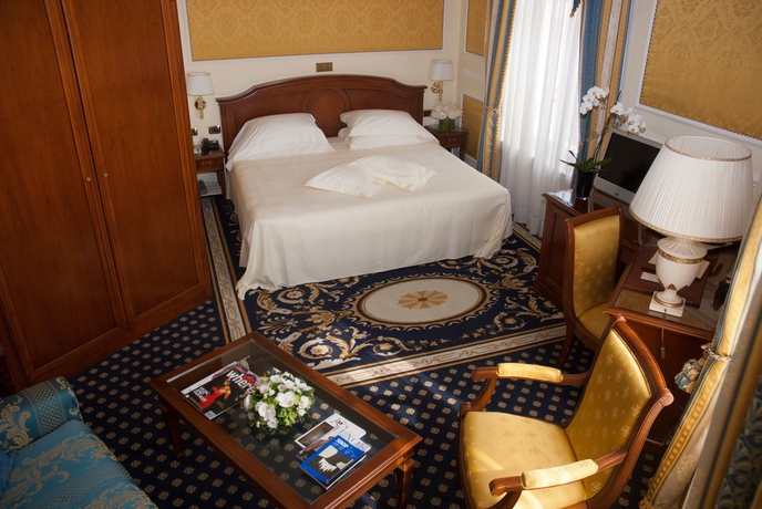 Imagen de la habitación del Hotel Grand Visconti Palace. Foto 11