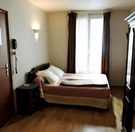 Imagen de la habitación del Hotel Grand Voltaire. Foto 5