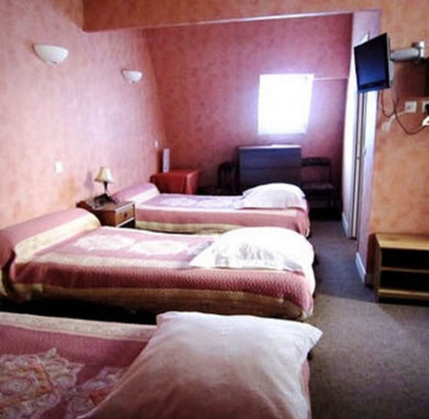 Imagen de la habitación del Hotel Grand Voltaire. Foto 12