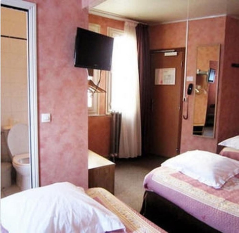 Imagen de la habitación del Hotel Grand Voltaire. Foto 13