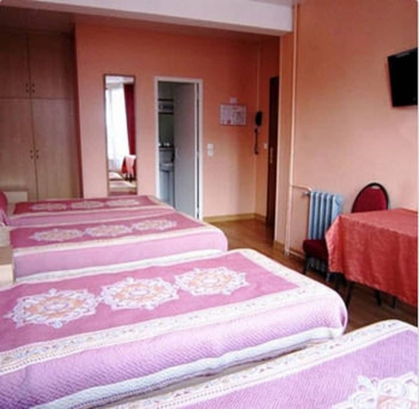 Imagen de la habitación del Hotel Grand Voltaire. Foto 14