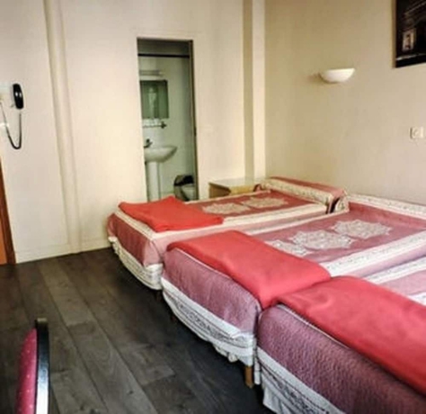 Imagen de la habitación del Hotel Grand Voltaire. Foto 15