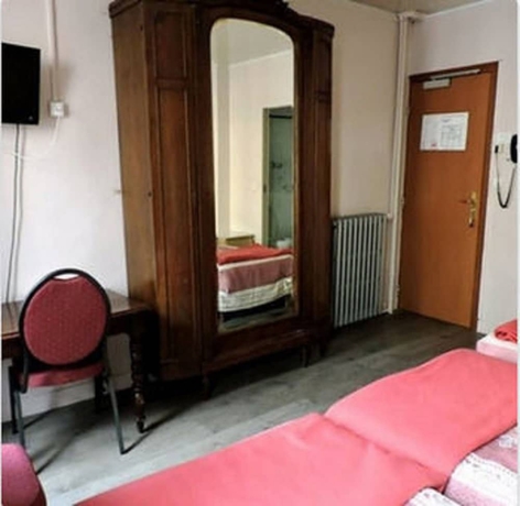 Imagen de la habitación del Hotel Grand Voltaire. Foto 16