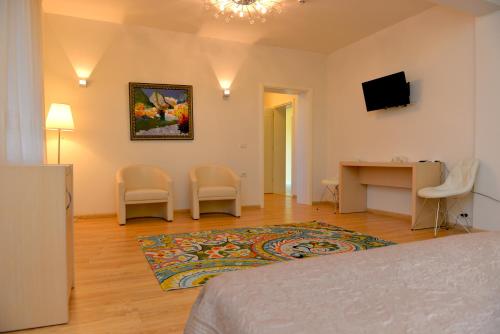 Imagen de la habitación del Hotel Grand White City. Foto 15