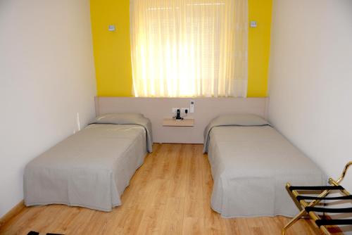 Imagen de la habitación del Hotel Grand White City. Foto 19