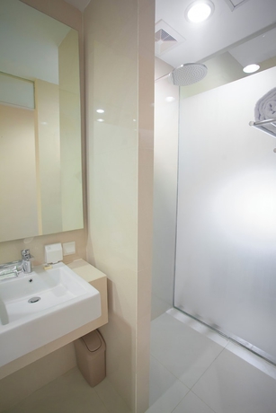 Imagen de la habitación del Hotel Grand Whiz Megamas Manado. Foto 10