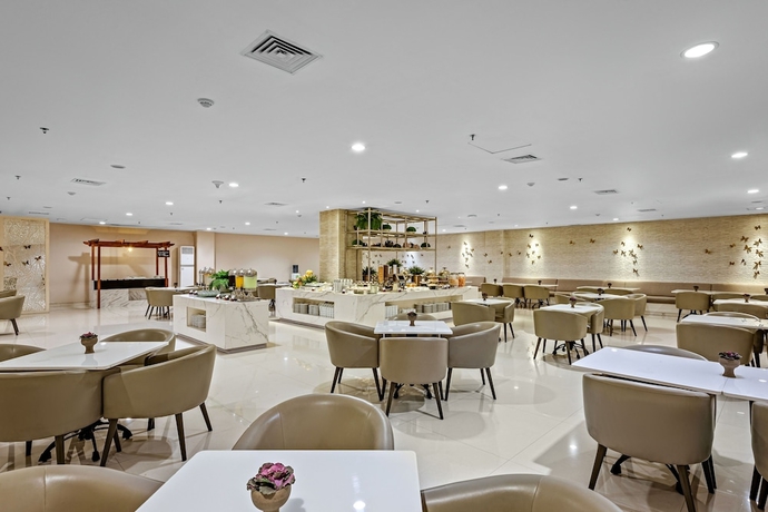 Imagen del bar/restaurante del Hotel Grand Whiz Megamas Manado. Foto 2