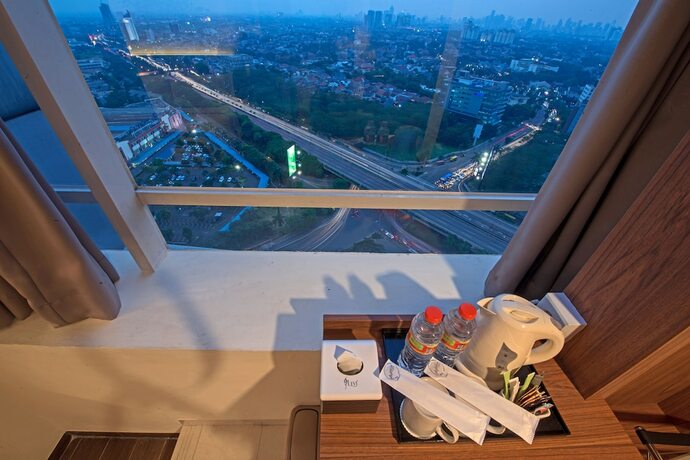 Imagen de la habitación del Hotel Grand Whiz Poins Square-Simatupang. Foto 13