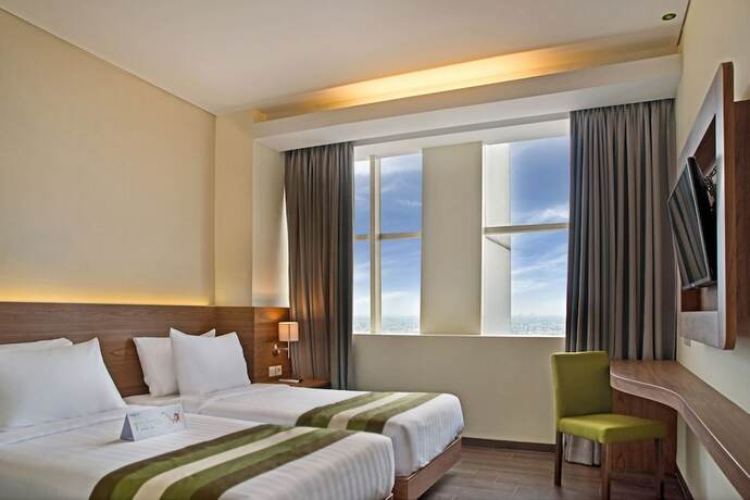 Imagen de la habitación del Hotel Grand Whiz Poins Square-Simatupang. Foto 17