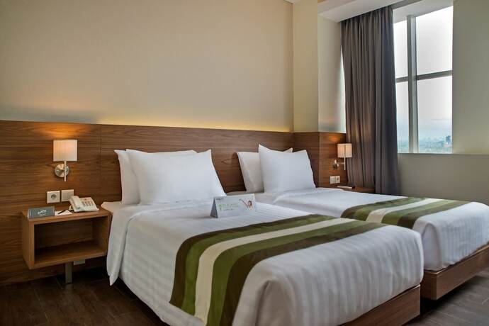 Imagen de la habitación del Hotel Grand Whiz Poins Square-Simatupang. Foto 23