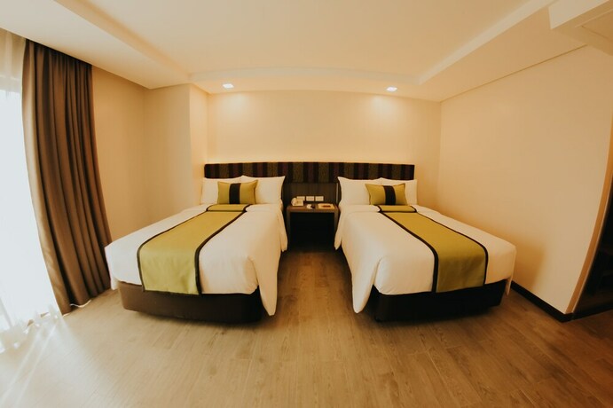 Imagen de la habitación del Hotel Grand Xing Imperial. Foto 26