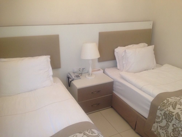 Imagen de la habitación del Hotel Grand Yazıcı Torba Beach Club. Foto 7