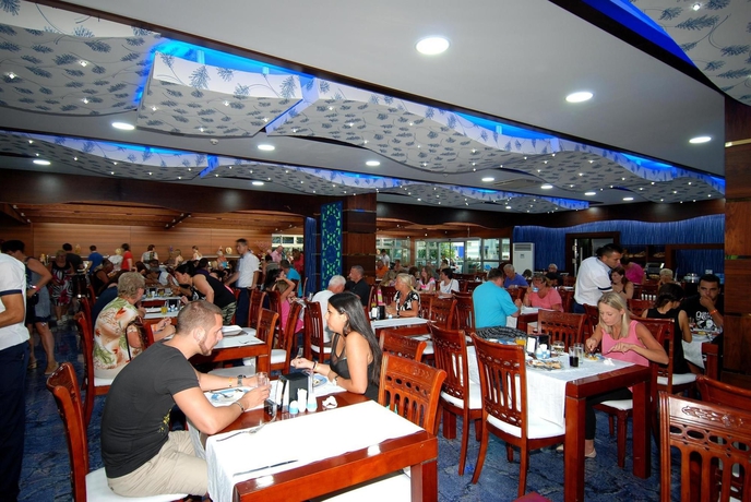 Imagen del bar/restaurante del Hotel Grand Zaman Garden - All Inclusive. Foto 8