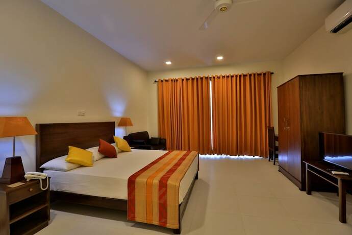 Imagen de la habitación del Hotel Grand and Gangula. Foto 19