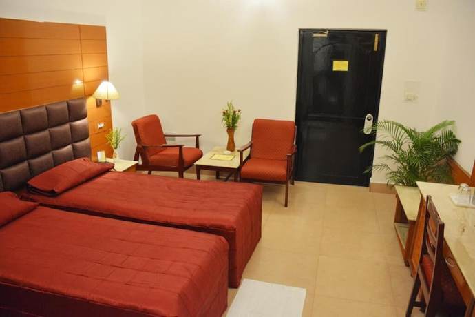 Imagen de la habitación del Hotel Grand central, Bhubaneswar. Foto 6