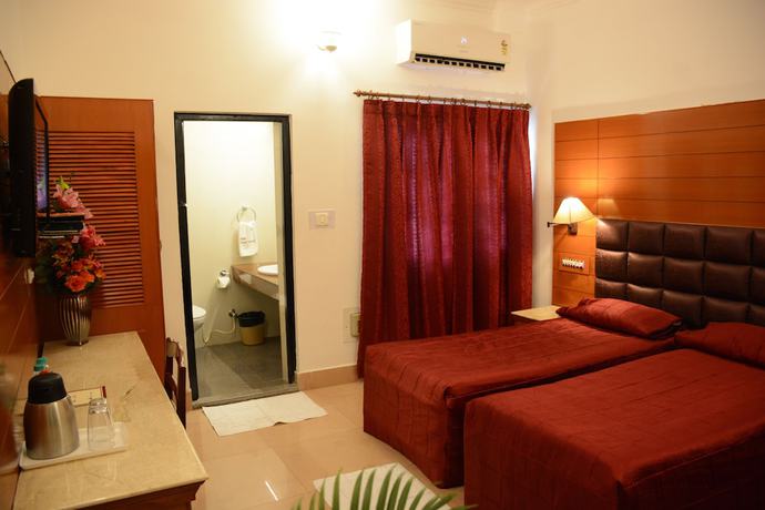 Imagen de la habitación del Hotel Grand central, Bhubaneswar. Foto 7