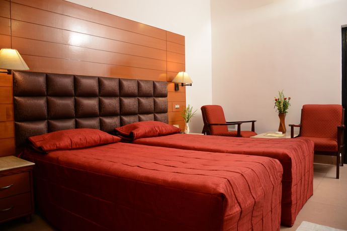 Imagen de la habitación del Hotel Grand central, Bhubaneswar. Foto 8
