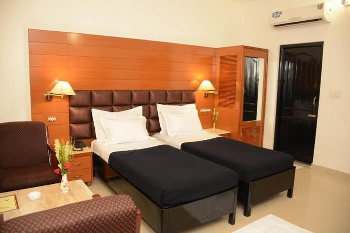 Imagen de la habitación del Hotel Grand central, Bhubaneswar. Foto 11