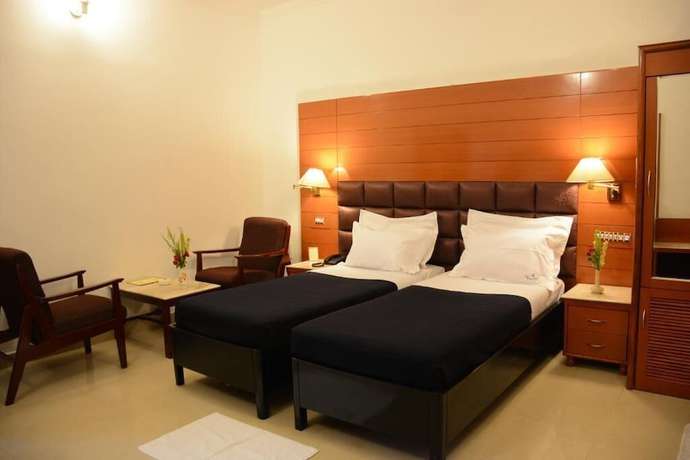 Imagen de la habitación del Hotel Grand central, Bhubaneswar. Foto 12
