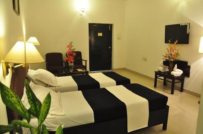 Imagen de la habitación del Hotel Grand central, Bhubaneswar. Foto 14