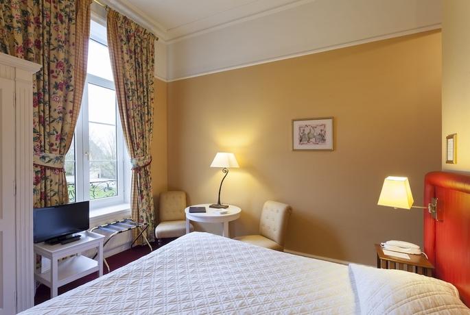 Imagen de la habitación del Hotel Grand 