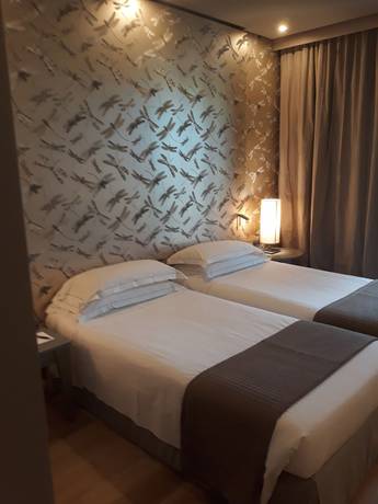 Imagen de la habitación del Hotel Grand de La Ville, Parma. Foto 9