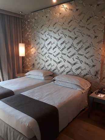 Imagen de la habitación del Hotel Grand de La Ville, Parma. Foto 11