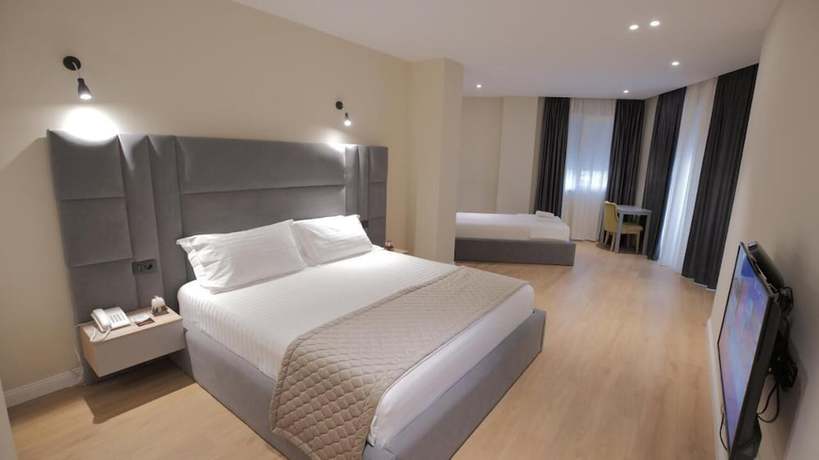 Imagen de la habitación del Hotel Granda, Tirana. Foto 10