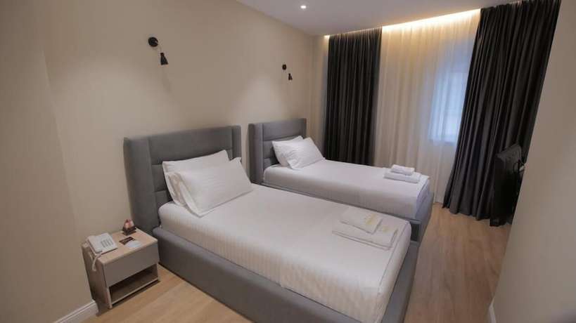 Imagen de la habitación del Hotel Granda, Tirana. Foto 13