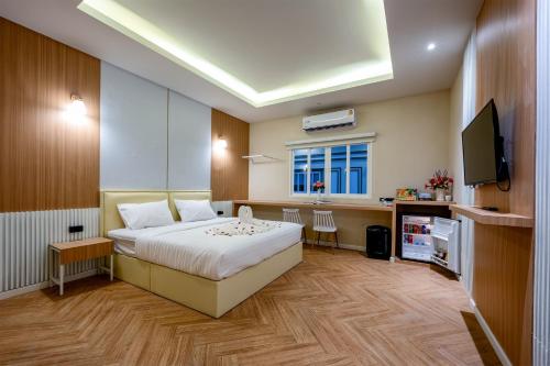 Imagen de la habitación del Hotel Grandbangsaray. Foto 19