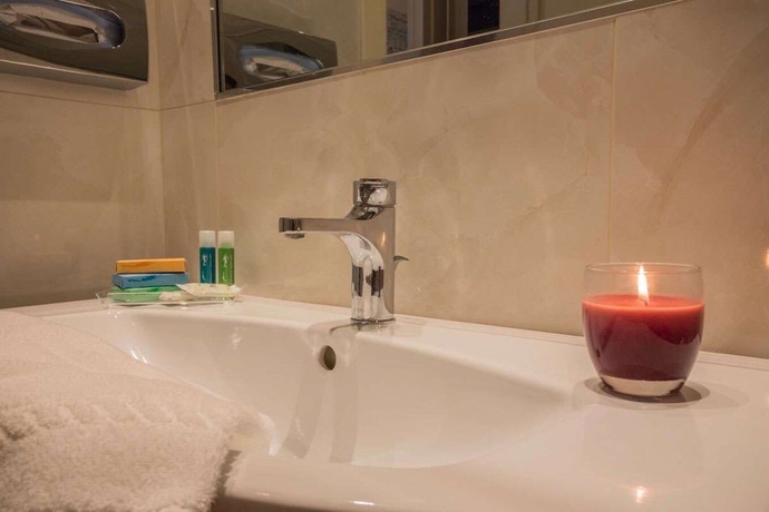 Imagen de la habitación del Hotel Grande Albergo Potenza. Foto 11