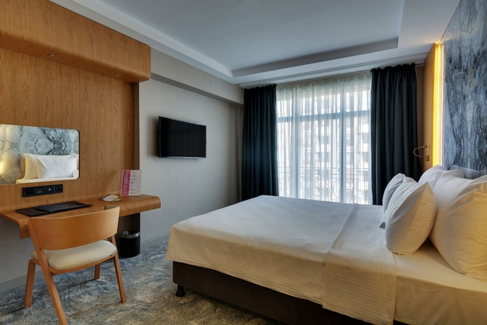 Imagen de la habitación del Hotel Grande Arte. Foto 15