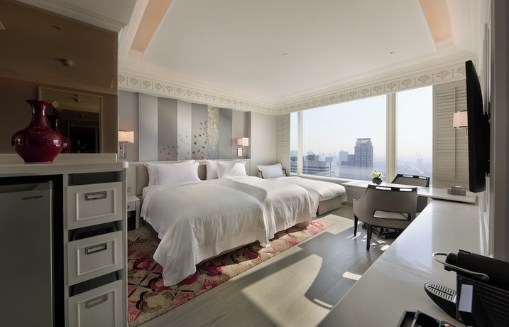 Imagen de la habitación del Hotel Grande Centre Point Lumphini Bangkok. Foto 12