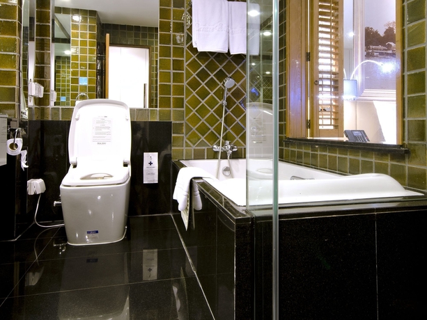 Imagen de la habitación del Hotel Grande Centre Point Ploenchit. Foto 2